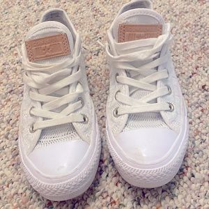 Converse. White. With like a weave style fabric. Size 5.5. Hardly worn.